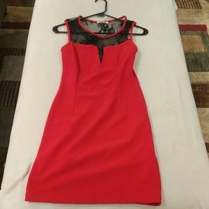 Red sleeveless dress with sheer black panels